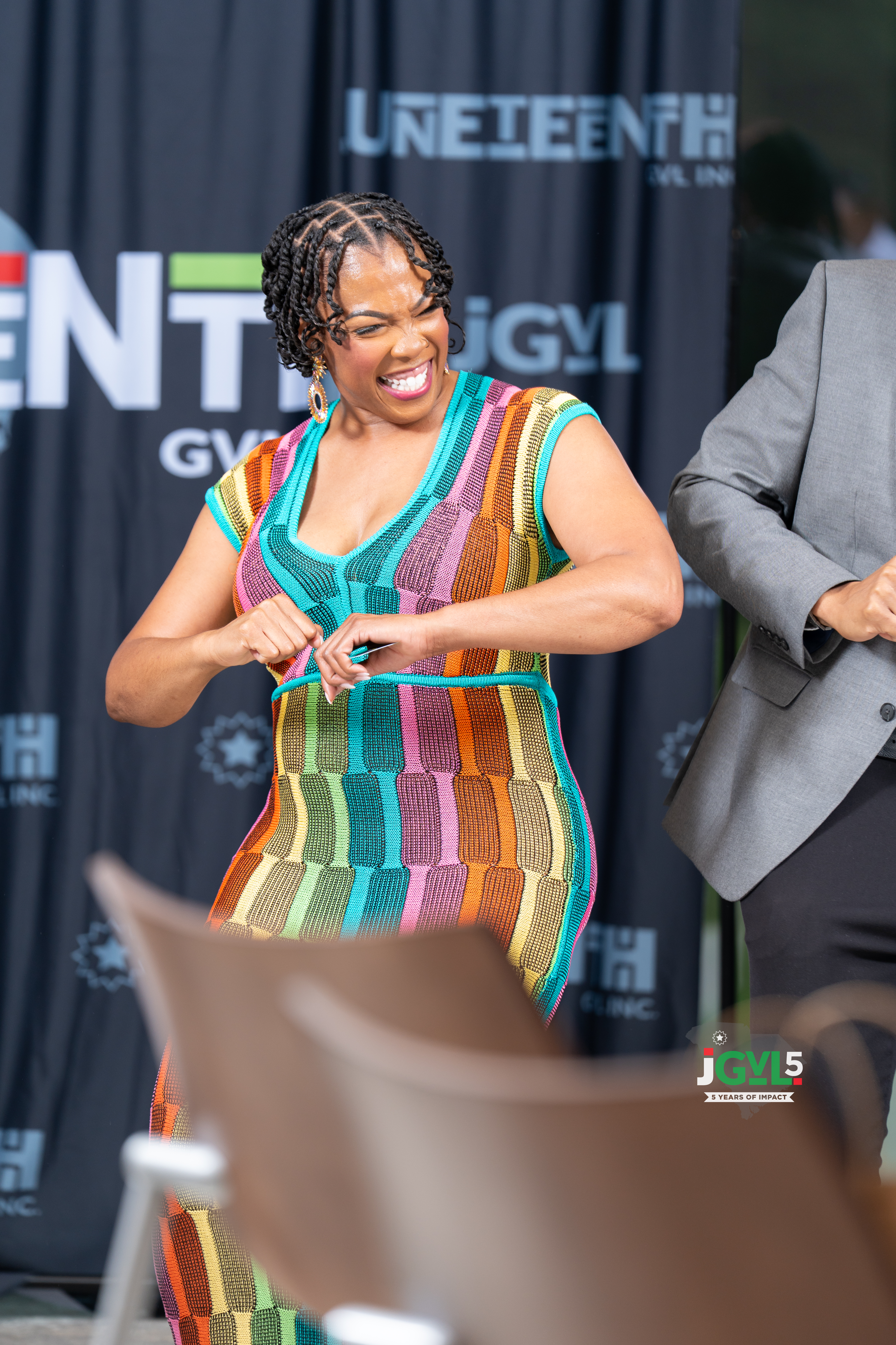 April smiling and dancing at a Juneteenth GVL gathering